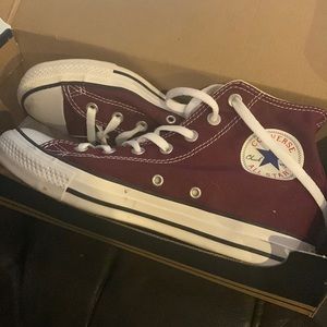 Converse high top burgundy shoes. Only worn for about 30 minutes!  In box!!!